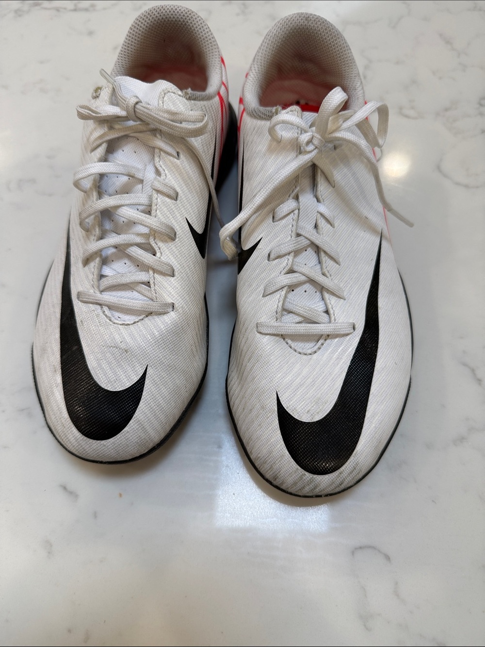 Nike Men’s White Athletic Shoes with Black Swoosh